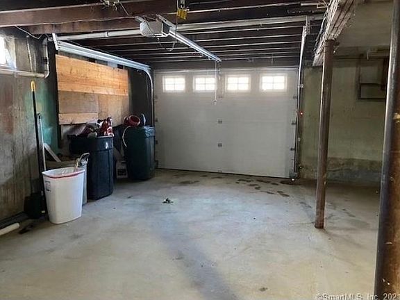 full basement with garage door