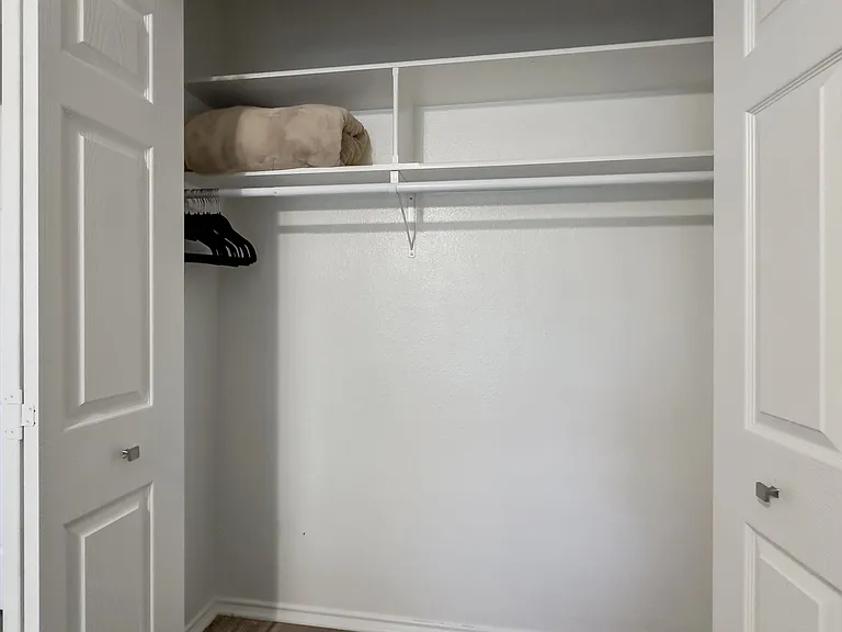 Secondary Bedroom Queen Plush Bed Full sized Dresser with Mirror and large closet