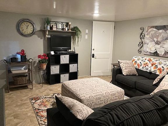 Entry door, furnished living area