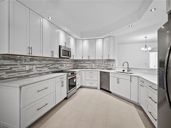 4th image of 7056 Pelican Bay BLVD #B-102