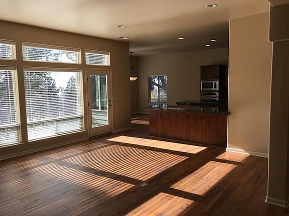 FROM GREATROOM TO KITCHEN AND PARTIAL VIEW OF EATING NOOK
