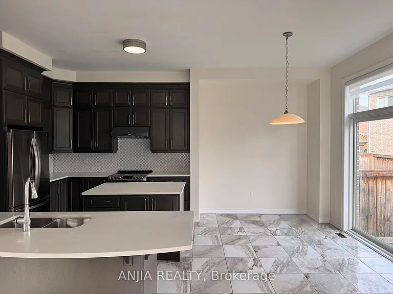 3345 Erasmum St — Photo 6