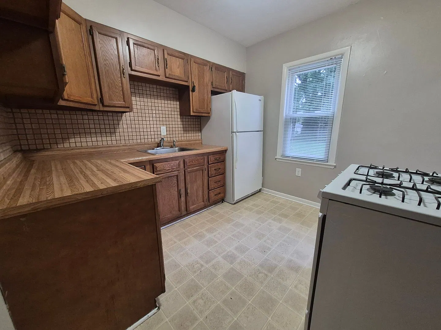 2 bedroom home with 2+ car garage and partially fenced, beautiful yard! — Photo 3