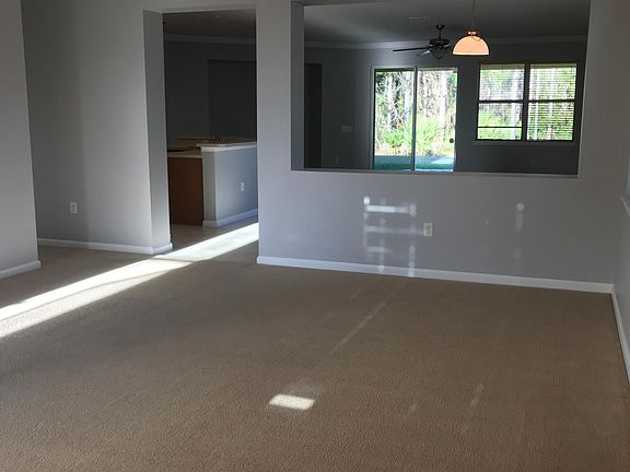Formal Living/Dining room with extended view to great room and beyond