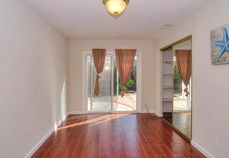 Room 4: Has it's own bathroom, Sliding doors to the backyard