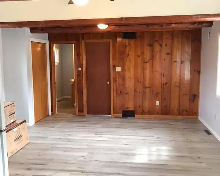 Living room area looking towards bathroom.