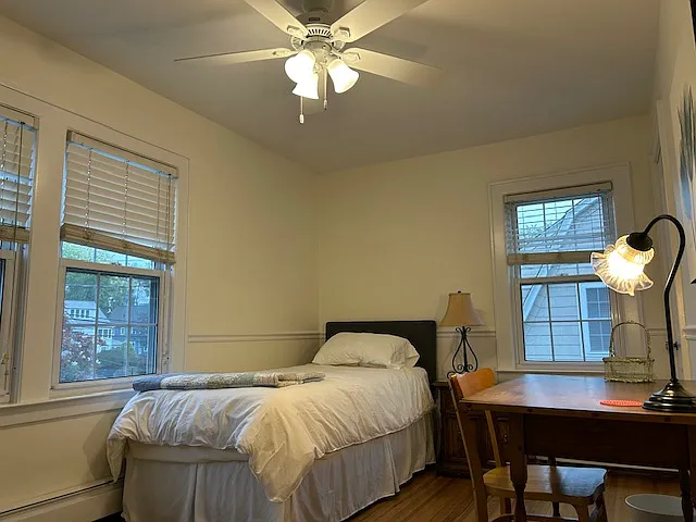 3rd bedroom with twin bed, dresser, and desk