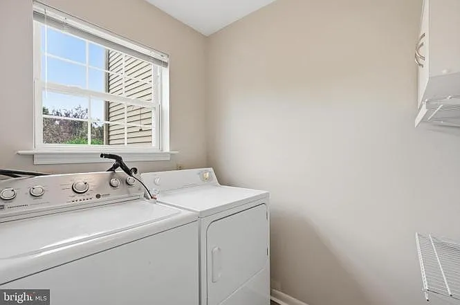 Laundry Room with closets