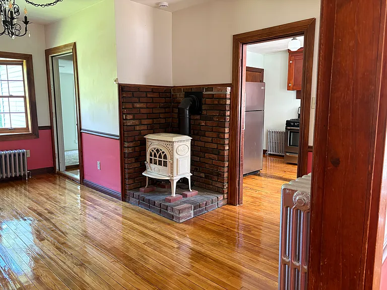 Living room/ dining room connecting to kitchen and bedroom