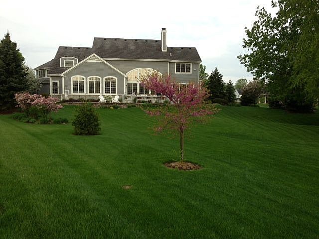 back of house faces pond