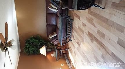 Hardwood Floors, Custom Window Treatment, and Crown Molding.