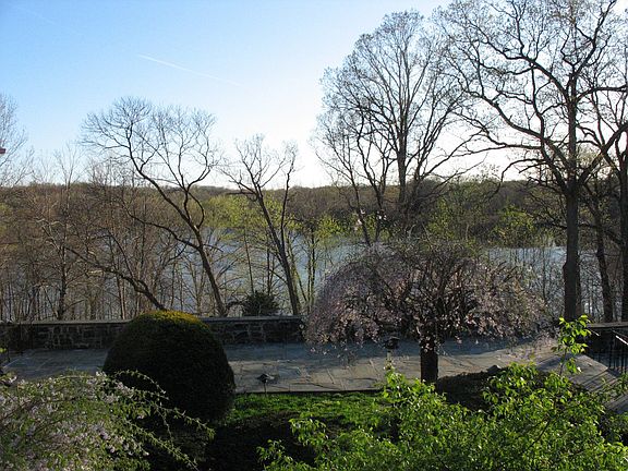 View from Master BR includes lake and courtyard