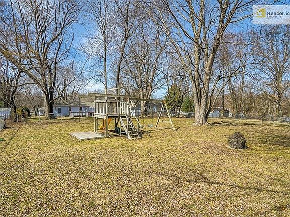 Large level and fenced back yard. Trees provide great shade for enjoying the hot summer days with your family and friends.