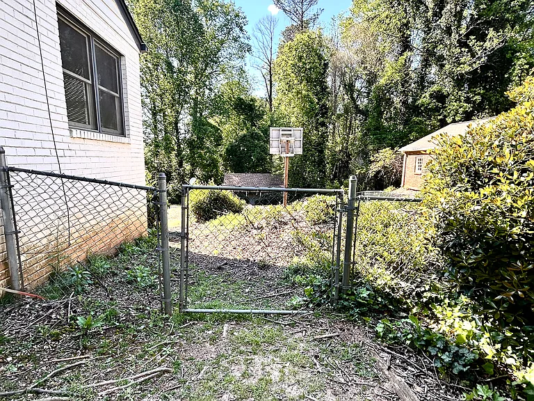 Fenced backyard .