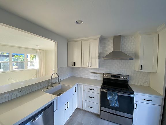 Recently remodeled kitchen with a breakfast bar.
