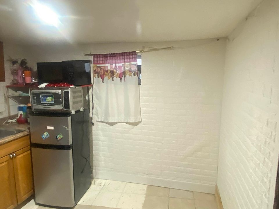 2nd image of 26-10 93rd St #Basement