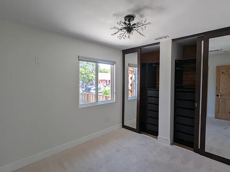 2nd Bedroom has two closets with a window overlooking the patio and lost of space.