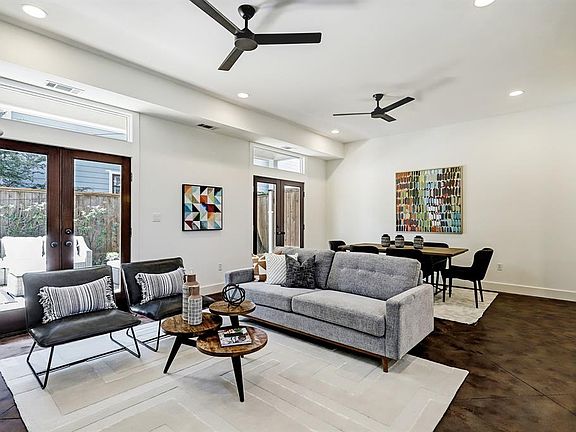 1st floor open living that transitions smoothly o the backyard thru wood french doors