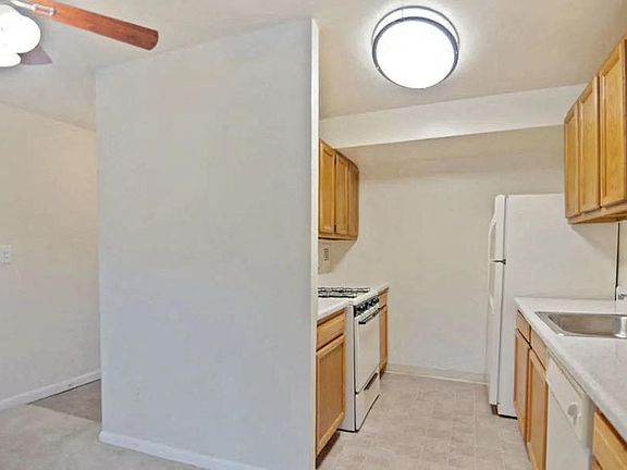 Open kitchen with a dishwasher at Broadfalls in Falls Church, VA