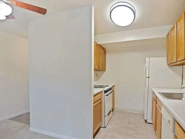 Open kitchen with a dishwasher at Broadfalls in Falls Church, VA