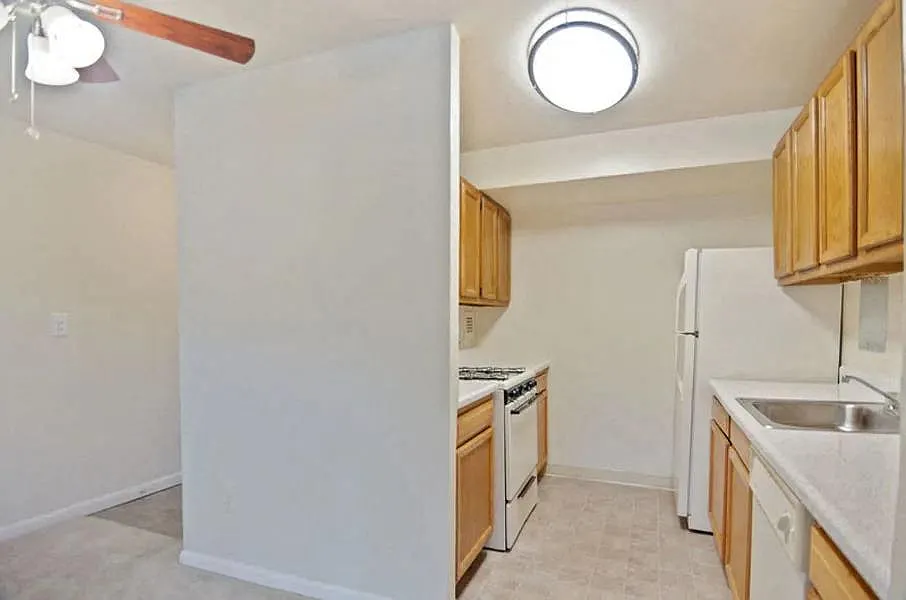 Open kitchen with a dishwasher at Broadfalls in Falls Church, VA