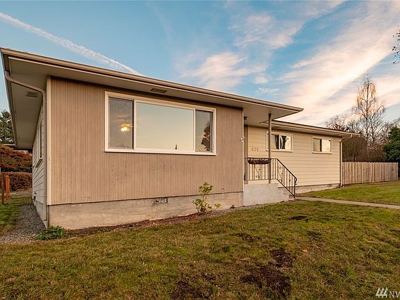 Corner shot from "F" and Rose. Ample roof overhang protects the home from elements. Standing in the living room window you can see the Olympic Mountains. 