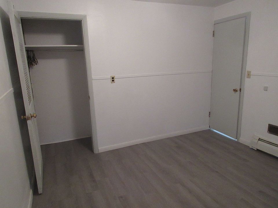 first bedroom (11 x 12) with door to living room