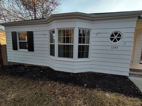 Wood shutters & Bay window
