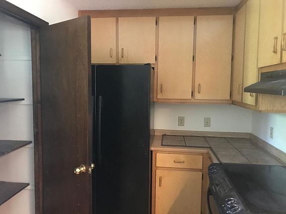 Kitchen, pantry and tiled countertops