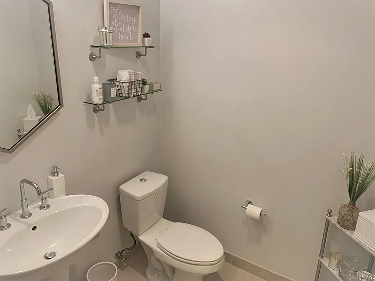 1/2 bath off of kitchen is great for guests