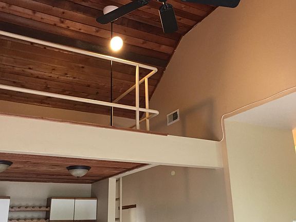 cathedral ceiling in living room & kitchen