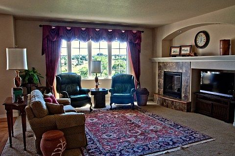 Living Room w/ Fireplace & Fantastic Golf Course Views