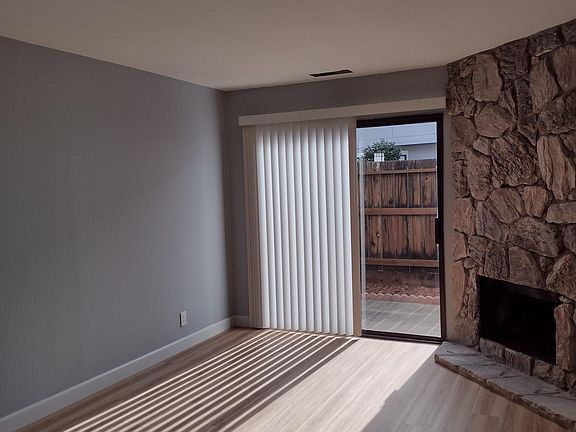 Patio is located off the living room. Fireplace is fully functional.