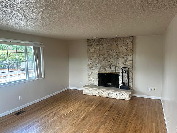 Living room and fireplace one