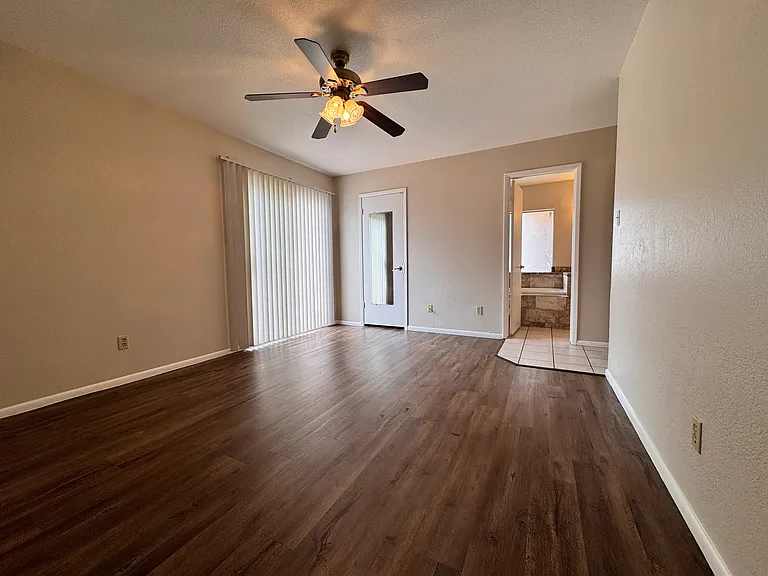 Bedroom 1 has access to pool, private bath and large walk-in closet