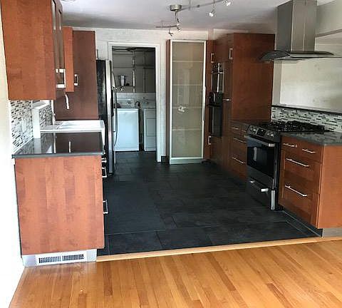 view from dining area into Kitchen
