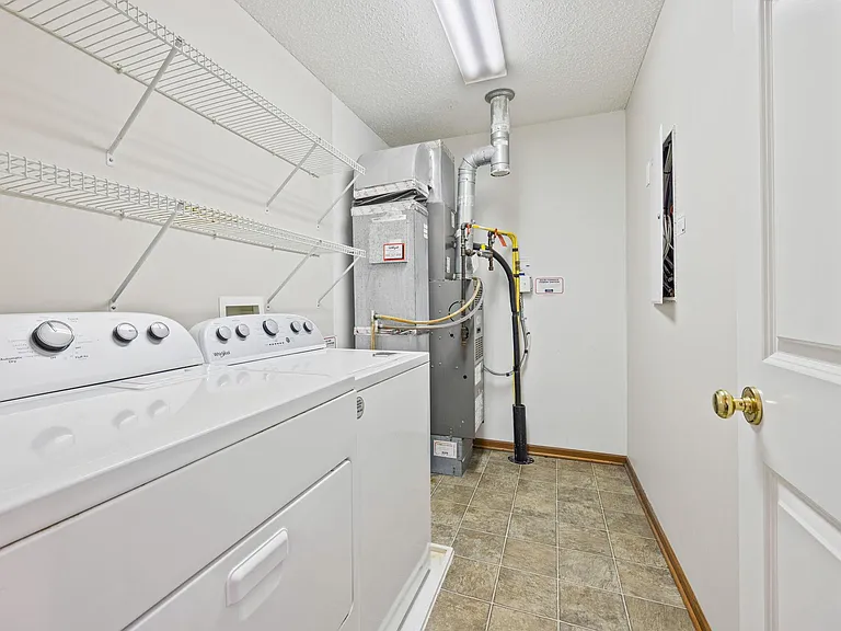 Washer/Dryer area on upper level near Bedrooms