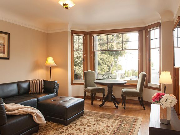 Huge picture windows with bay views. Hardwood floors, Mahogany trim throughout and coved ceilings.