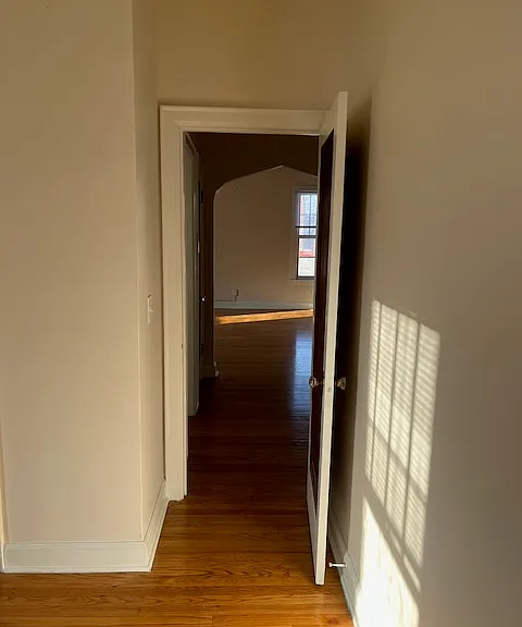 View from bedroom into the hallway/living room