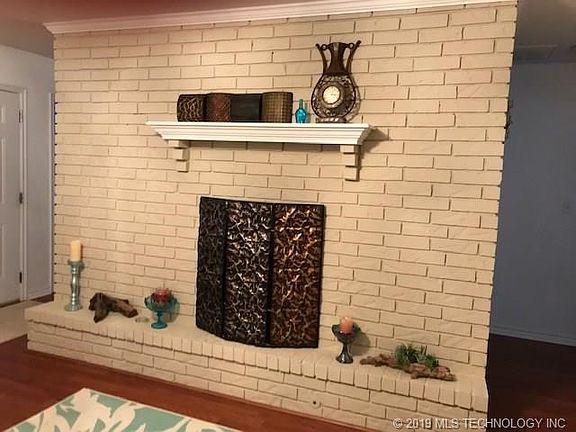 Wood burning fireplace with gas starter