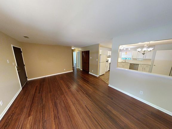 Living room with view to the kitchen