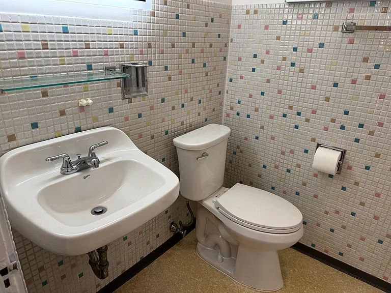 Retro bathroom tile with LED lit mirror