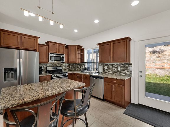 2nd image of 8935 S Quarry Stone Way E