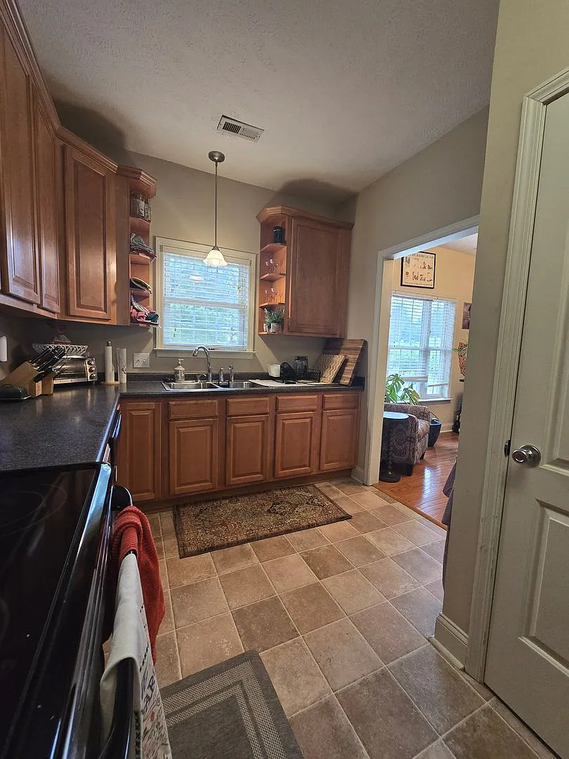 Price Reduced- 4 Bedroom, 3 Bath Home Located In Carolina Lakes - Community Pool Access! — Photo 2