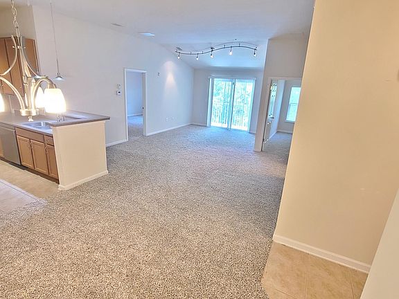 Large open living space that flows to a private balcony.