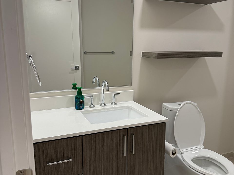 Bathroom - sink features ample under sink storage space and three drawers.