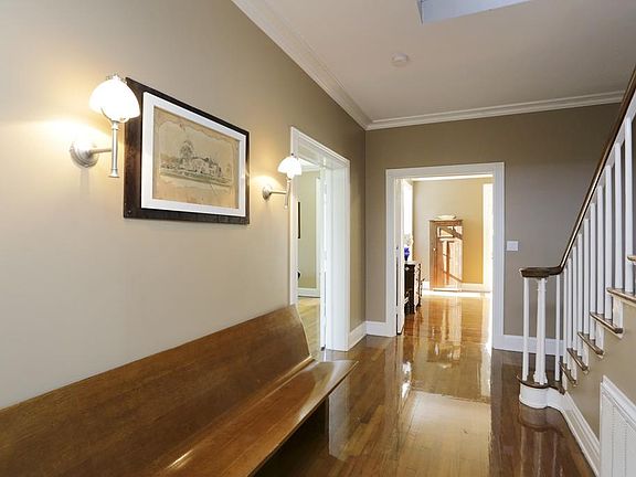 Elegant entry leading to formal dining room and formal living room.