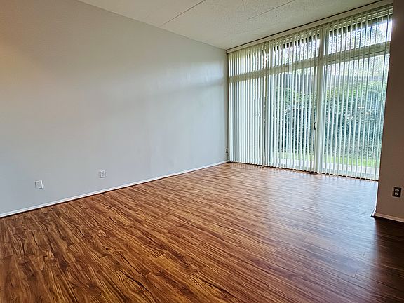 Living room with floor to ceiling windows