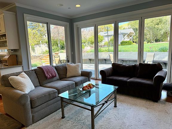 Family room with Nana doors to back patio and yard