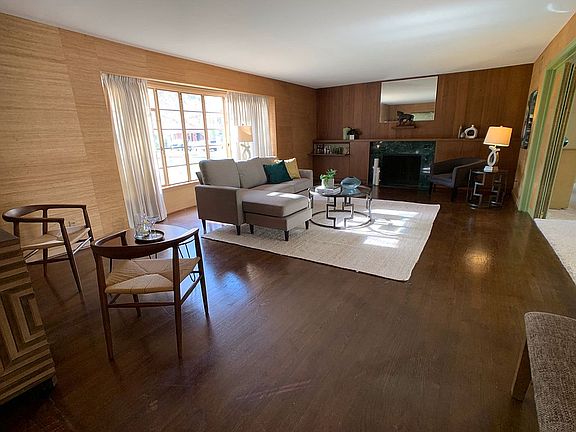Living w/ marble fireplace